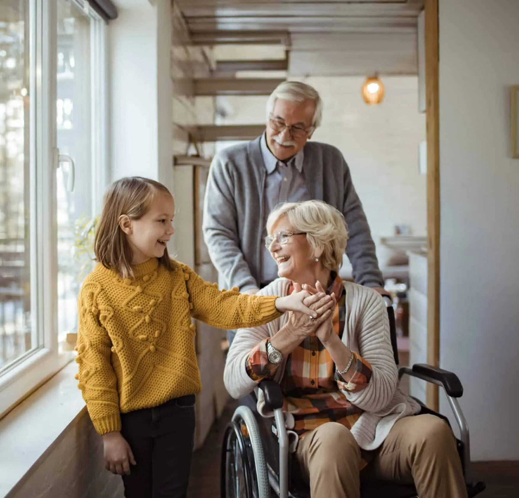 Granddaughter with her Grandparents in a nursing home