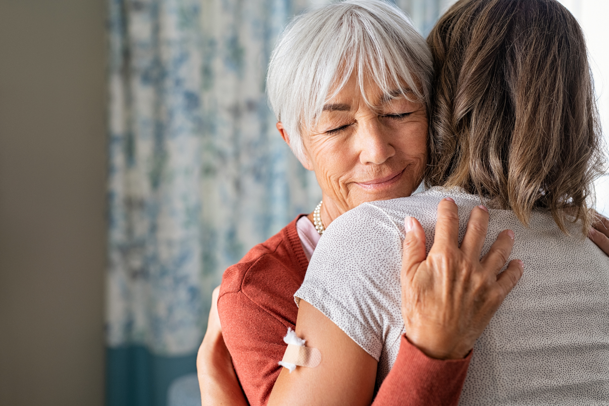 Woman hugging another woman - Complex care case