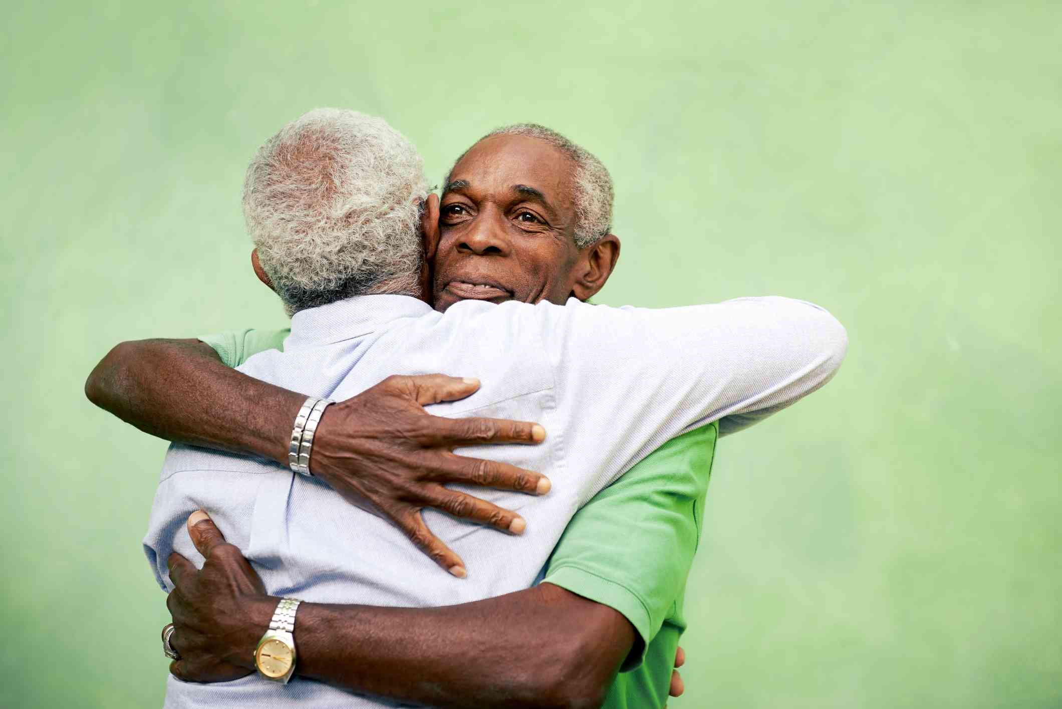 Two men hugging