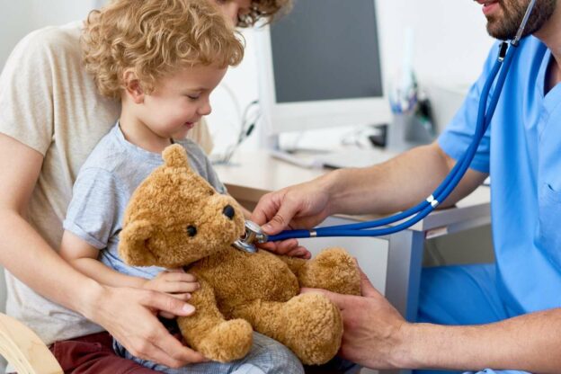 A child being examined by a doctor