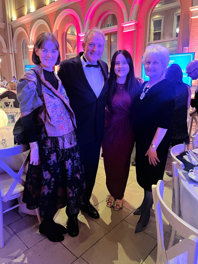 Group of smiling people at a Gala